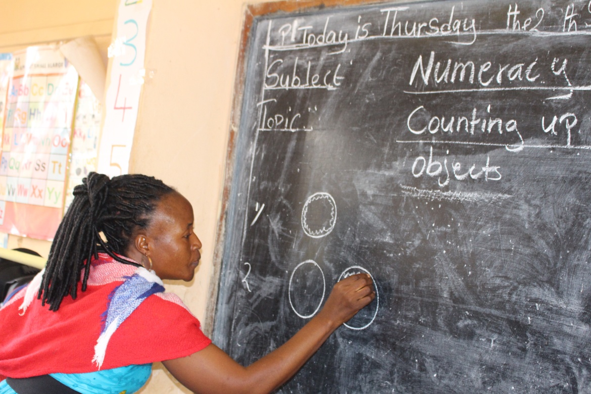 Grade 1 teacher, Martha Mansaray, leads a numeracy lesson at Freetown Polytechnique Practicing Primary School, Sierra Leone. Credit: UNICEF Sierra Leone/2024/Davies
