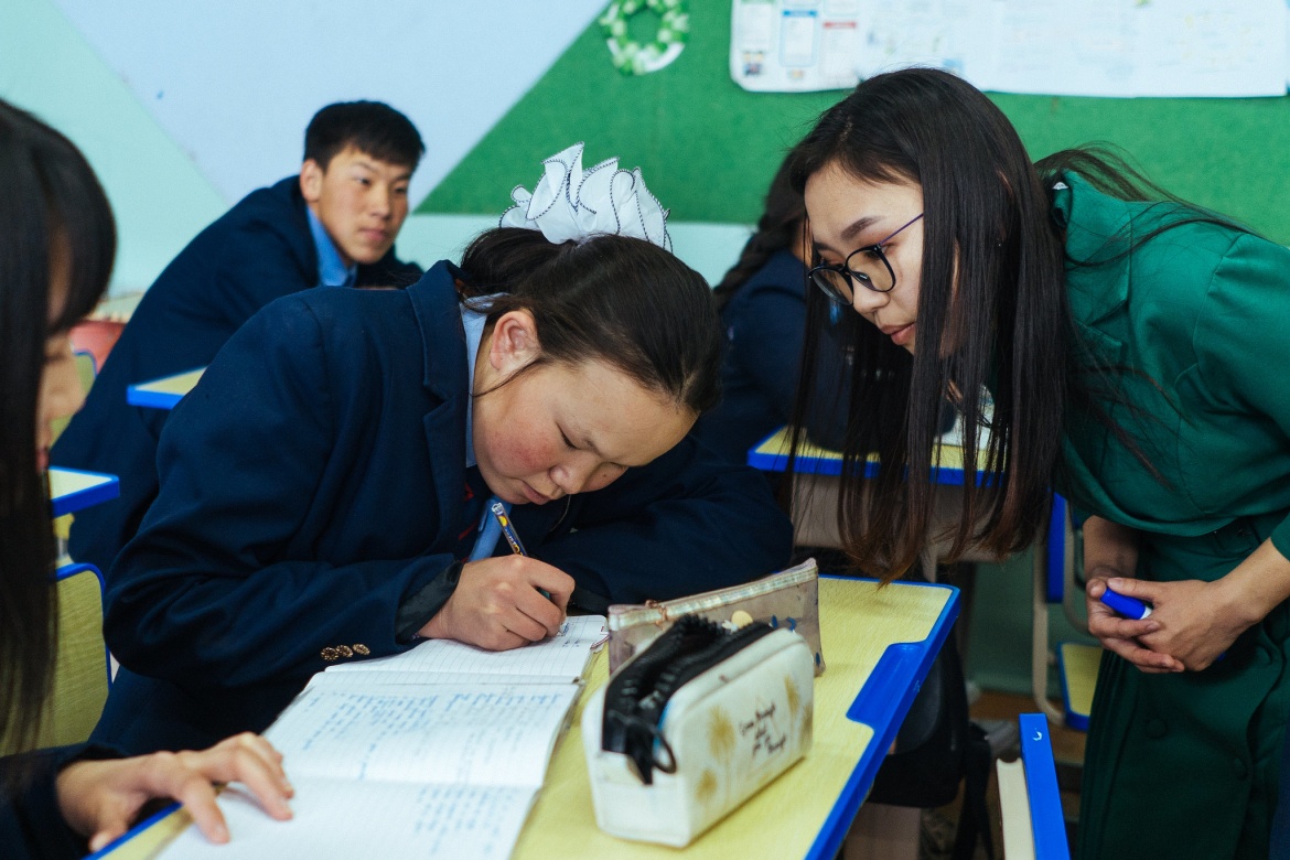 17-year-old deaf student Oyunjargal Gansukh concentrates during a language lesson at School 212 in Murun, Mongolia. March 2023