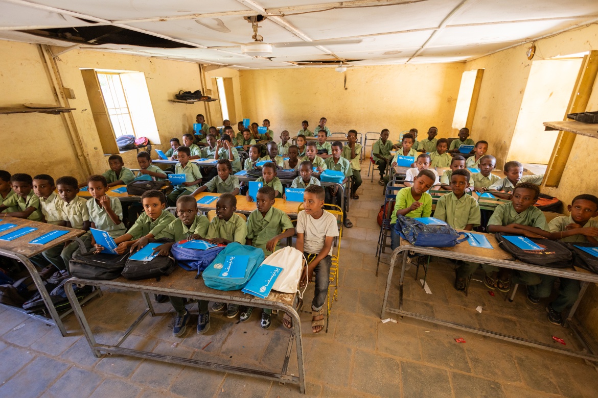 Students at Eltaka Safe Learning Space received backpacks, notebooks, pens, colored pencils, school bags and recreational materials at the beginning of learning term, Kassala State, Sudan. Credit: UNICEF/UNI675763/Elfatih